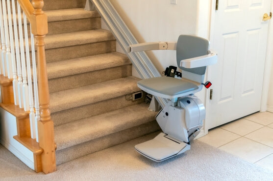 Picture of a grey a straight stairlift.