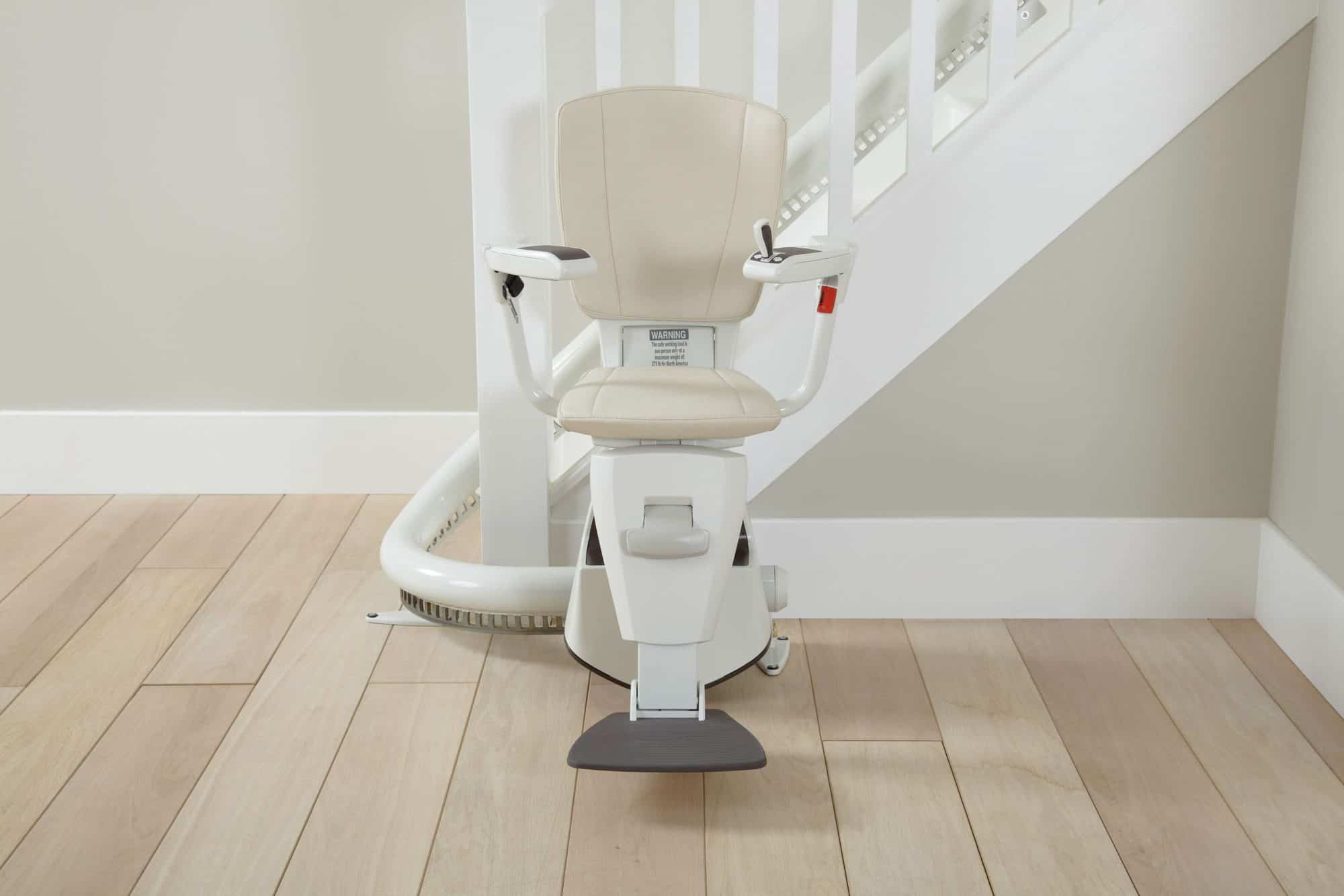 Flow2 curved stairlift with supportive seat and slim rail system