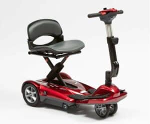 Multicare multi fold dual wheel foldable scooter in black and red
